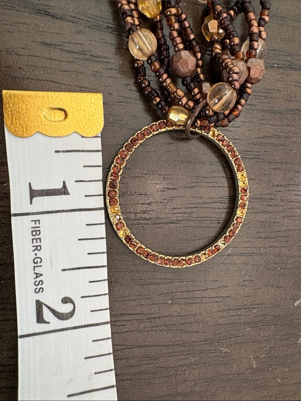 Multi-Strand Brown and Gold Beaded Necklace with Circular Pendant